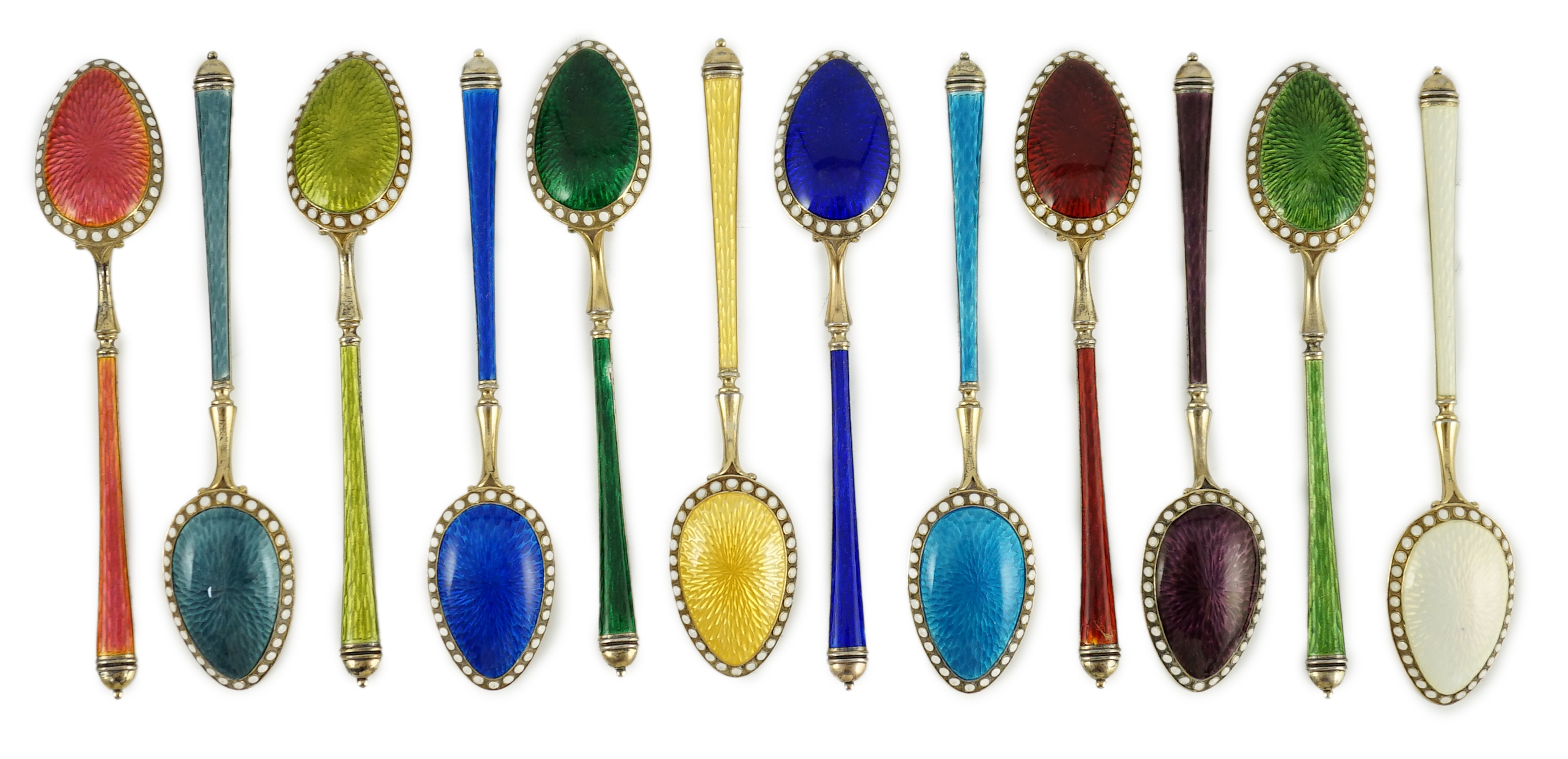 A cased set of twelve Norwegian silver gilt and polychrome enamel coffee spoons, retailed by Tiffany & Co